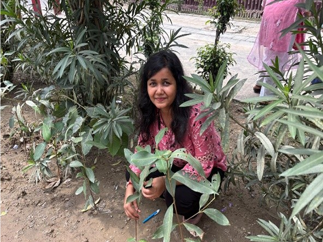 group with newly planted saplings