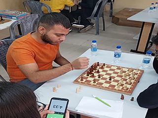 Student Playing Chess