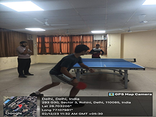 Student playing table tennis